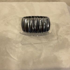 Unique and rare expandable cuff metal bracelet. Made in Hong Kong.